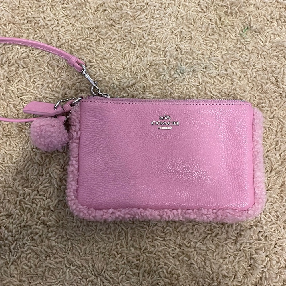 Coach leather and sherpa trimmed wristlet